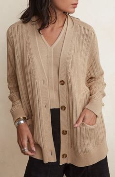 Slightly oversized fit. Delicate open crochet ribbing adds texture and dimension to this elevated, luxe cardigan. Features lower armhole, front pockets and ribbed-trim finish. The perfect go-to layering piece for this spring. Medium spring weight Model is a size 4 and wears a size XS/S XS/S size is 26 1/2" length/ 22 1/2" chest flatt slightly tapered hem and cuffs sustainable 55% silk/45% cotton Machine wash delicate/ low dry Oversized Textured Knit Cardigan, Long Sleeve Open Knit Cardigan For Work, Oversized Open Knit V-neck Outerwear, Oversized Textured Knit Cardigan For Work, Chic Oversized Ribbed Cardigan, Oversized Cable Knit Cardigan For Work, Oversized Pointelle Knit Cardigan, Oversized Pointelle Knit Cardigan For Fall, Crochet Ribbing