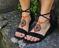 This listing is for a PAIR of beautiful and UNIQUE barefoot sandals handmade in the HUICHOL style. Made of high quality Japanese myuki seed beads and extra strong nylon thread. They make a beautiful combination with the leather sandals (pictures 4,7 and 10) also available in my shop. These sandals are very resistant and suitable for many environments. They will embellish your feet and you can wear it with sandals in a variety of styles from work to casual to evening attire. Beautiful to wear on Adjustable Ankle Strap Huarache Sandals For Festival, Traditional Handmade Adjustable Huarache Sandals, Handmade Huarache Sandals For Summer Fiesta, Bohemian Open Toe Huarache Sandals, Bohemian Open Toe Sandals For Fiesta, Multicolor Handmade Huarache Sandals For Festivals, Handmade Bohemian Huarache Sandals For Beach, Handmade Bohemian Huarache Sandals For Vacation, Multicolor Bohemian Barefoot Sandals Open Toe