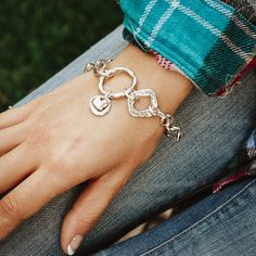 Rustic silver charms, hand sculpted links, and romantic charms all make up this rugged amulet heart charm bracelet. A single link reads "love your soul" on the back. Length 7 - 8" adjustable Sterling silver Lobster claw clasp Made by hand and heart Love Your Soul, Handmade Heart, Heart Bracelet, Heart Jewelry, Heart Charm Bracelet, Your Soul, Love Your, Infinity Bracelet, Silver Charms