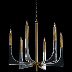 a chandelier with six candles hanging from it