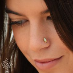 14k SOLID GOLD or SILVER STERLING white opal drop stud earring. SINGLE Perfect for a variety of piercing locations: nostril / lobe / 3rd, 2nd hole earring / tragus / conch / helix / cartilage ---> Features: ♦ Material: SILVER STERLING / 14k SOLID GOLD ♦ size: length: 3.5mm*8mm Select your preference in the gauge / end shape at the top right of this page. ♦ Gauge: wire hoop thickness: Select your preference in the gauge at the top right of this page. *Gauge: the thickness of the wire the small Dainty White Nose Rings For Gift, Piercing Locations, Tragus Gold, Opal Nose Stud, Tiny Nose Studs, Nose Ring Jewelry, Blue Opal Earrings, Nose Screw, Gold Nose Stud