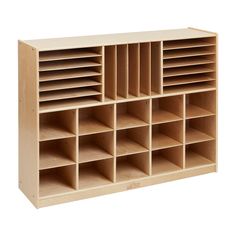 a large wooden shelf with compartments and dividers