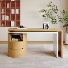 a wooden table sitting on top of a white carpeted floor next to a book shelf