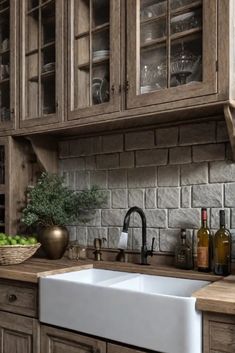 a kitchen with wooden cabinets and white sink