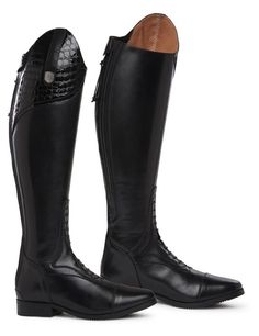 a pair of black riding boots with zippers