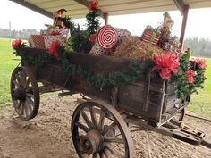 an old wagon with christmas decorations on it