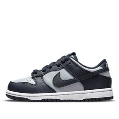 The Nike Dunk Low PS ‘Georgetown’ delivers a two-tone edition of the retro hoops shoe in the signature colors of the Hoyas. Made with a leather upper in Wolf Grey and Dark Obsidian overlays, this shoe is perfect for little kids who want to show their support for their favorite team. The Nike branding on the woven tongue tag and heel tab adds a touch of style, while the low-cut collar allows for a full range of motion. The perforated detailing at the toe box offers improved breathability, and the dark navy rubber outsole provides excellent traction. (SNKR/Skate/Casual/Low Top/Classic/Colorblock) Nike Dunk Low Georgetown, Cute Nike Shoes, Hype Shoes, Cute Nikes, Shoe Inspo, Swag Shoes, Grey Sneakers, Nike Dunk Low, Pretty Shoes