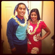 a man and woman are dressed up in hawaiian costumes for a photo shoot together at home