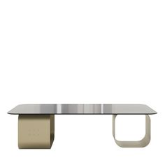 a modern glass table with metal legs