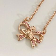 Vivienne Westwood Ribbon Heart Necklace Pink Gold w/storage drawstring | eBay Pink Vivienne Westwood Bracelet, Jewellery Vivienne Westwood, Cute Jewelry Display, Layered Jewelry Gold, Big Gold Jewelry, Matching Stuff For Best Friends, Christmas Gifts For Gf, Handmade Gifts For Sister