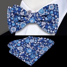 Blooms of Elegance: The Shades of Blue and White Floral Silk Bow Tie A Garden of Style Blooms in Every Knot In the world of men's fashion, a bow tie is not just an accessory; it's an emblem of style and individuality. Our Shades of Blue and White Floral Silk Bow Tie transcends traditional boundaries, offering a garden of intricate flowers that tell a story of elegance and sophistication. In this blog post, we immerse ourselves in the details of this silk masterpiece, exploring styling options, p Summer Blue Bow Tie Suit Accessories, Summer Blue Bow Tie And Suit Accessories, Blue Bow Tie For Summer Weddings, Blue Bow Tie For Wedding And Father's Day, Blue Bow Gift For Summer, Classic Blue Bow Tie For Groom, Blue Bow Ties For Gifts, Summer Blue Bow Tie And Accessories, Blue Wedding Ties With Decorative Bow