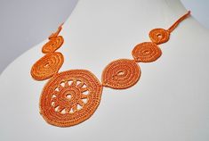 Handmade Crochet Orange Necklace, Round Necklace, Great Gift, Perfect Accessory It is beautifully handcrafted. It is a great gift for your girlfriend, mother, or anyone who loves handmade accessories! Feel free to reach us out if you have any questions. Ready to be shipped in 1 business day. Unique Crochet Jewelry As Gift, Unique Crochet Jewelry As A Gift, Unique Crochet Jewelry For Gifts, Round Crochet Jewelry As Gift, Adjustable Crochet Necklace For Gifts, Unique Crochet Necklaces For Gifts, Unique Crochet Necklace As Gift, Handmade Orange Round Necklace, Handmade Orange Round Jewelry