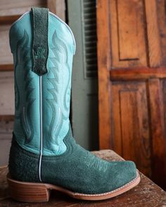 R. Watson presents these teal rough out and mint cowhide western boots. These boots have a 10 row stitch pattern, R. Watson comfort system, all leather stacked heel, counters, solid steel shank, and 10 iron outsole. 13″ total in height. Additional information Heel Cowboy Toe 1-Cutter Top Cowhide Top Color Mint Vamp Rough Out Vamp Color Teal Felt Cowboy Hats, Straw Cowboy Hat, Concert Fashion, Western Design, Cap Fashion, White Stars, Ankle Bootie, Kids Boots, Dress And Heels