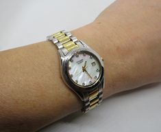 "vintage Citizen ladies mother of pearl with diamond dial?  Has a  well made bracelet size with all its original links. genuine very well made with nice movement On the dial  citizen Quartz  Nice date case  and well made bracelet  Tested 48hrs keeps time well as it should with no issues. New seiko battery just fitted bands:  original 6.8\" max van be downsized with link removal. Crown : original crown,  Size:  28.11 mm with crown Light age related wear to GP \"Please see photographs for condition  All the watches are pre owned unless stated otherwise,  they are not new watches & therefore please expect them to be in used condition,  this may include some scratches & or marks etc. Watch is in working condition\" \"see pics\"  and make your own mind up" Ingersoll Watches, Ladies Dress Watches, Diamond Watches Women, Vintage Watches Women, Gold Watches Women, Diamond Watch, Quartz Watch, Gold Watch, Bracelet Sizes