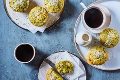 two plates with muffins and coffee on them