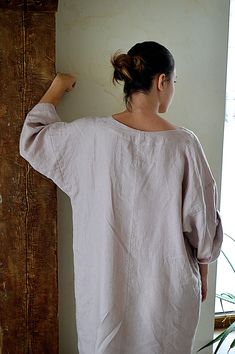 "Midnight blue oversize handmade soft linen women's loose tunic/dress. The tunic is +/- 37.4 \" (95 cm) long. Choose size: XS Bust 82 - 84 cm. ( 32 1/4\" - 33\") Waist 66 - 68 cm. / (26\" - 26 3/4\") Hips 90 - 92 cm. / (35 1/2\" - 36 1/4\") S Bust 86 - 88 cm. ( 33 3/4\" - 34 3/4\") Waist 70 - 72 cm. / (27 3/4\" - 28 1/4\") Hips 94 - 96 cm. / (37\" - 37 3/4\") M Bust 90 - 92 cm. ( 35 1/2\" - 36 1/4\") Waist 74 - 76cm. / (29 1/4\" - 30\") Hips 98 - 100 cm. / (38 1/2\" - 39 1/4\") L Bust 94 - 96 cm Beige Linen Tunic With Relaxed Fit, Oversized Linen Tunic Dress, Oversized Linen Bohemian Tunic, Oversized Bohemian Linen Tunic, Oversized Linen Lagenlook Dress, Oversized Linen Tunic For Loungewear, Linen Culottes, Casual Linen Pants, Linen Kimono