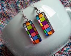 Vibrant, Colorful Checkerboard Rectangle Handmade Glass Statement Earrings A perfect gift and choice for any occasion. Will go well with any outfit. Measures 25 mm in length and 10 mm in width. Comes with First Class Free shipping. Colors may vary due to monitor and lighting differences. Handmade Multicolor Square Earrings, Square Multicolor Earrings For Gift, Modern Multicolor Rectangular Jewelry, Nickel-free Multicolor Rectangular Earrings, Multicolor Rectangular Jewelry Gift, Multicolor Square Jewelry Gift, Modern Multicolor Earrings As A Gift, Modern Multicolor Earrings As Gift, Multicolor Rectangular Jewelry For Gifts