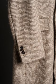 A handmade bespoke overcoat crafted from a luxurious fabric with a unique blend of fibers (wool, alpaca, mohair, silk and nylon) to give you the ultimate do-it-all coat. Wool gives it lasting performance and versatility. Alpaca gives it softness and warmth. Mohair gives it a crisp drape with natural wrinkle-resistance. Silk gives it a luster and natural sheen. And nylon gives it strength and durability to last the test of time. You will love this coat - it will elevated your entire wardrobe and you will wear it for many years to come. Luxury Brown Wool Coat With Notch Lapel, Beige Long Wool Coat With Concealed Placket, Luxury Single Breasted Beige Wool Coat, Luxury Beige Single Breasted Wool Coat, Beige Wool Coat With Notch Lapel, Beige Notch Lapel Wool Coat, Business Cream Wool Coat, Beige Wool Coat With Concealed Placket For Business, Beige Wool Coat With Hidden Buttons For Formal Occasions