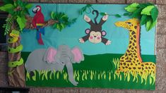 a bulletin board with animals and giraffes on it