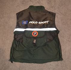 Vintage 90s Rare  Limited Edition Polo Sports Sportsman Ralph Lauren Trek Vest Jacket Great Condition An Ideal piece for Polo Ralph Lauren Collectable Lovers. Size  L  On Tag Measurements: Pit To Pit - 23  Inch Collar To Bottom - 24 Inch Pit To Sleeve End -  100% Authentic.  Good Condition. No Holes, or stains or broken zip. Shell:  100% Nylon Lining: 100% Polyester Made in Thailand Polo Sport Ralph Lauren, Vintage Polo Ralph Lauren, Vintage Polo, Down Vest, Vest Jacket, Polo Ralph, Vintage 90s, Under Armour, Mens Jackets