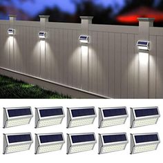 six solar powered motion sensor lights next to a fence