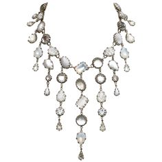 Fabulous De Luxe NYC/A'dam silver tone and art glass drop necklace with a curb link extension chain. Dropping from the necklace are beautiful white, clear and opaline glass drops. The necklace measures length 53.34cm / 21 inches, and the longest drop is 13.8cm / 5.4 inch. This quality necklace is in very good condition, the back retains some of the original patina. This is a glamorous and detailed vintage necklace by Dutch designer Michiel Alexander Ansignh who founded De Luxe NYC/A'dam. It look Silver Drop Necklace With Cabochon, Silver Teardrop Jeweled Necklace, Silver Teardrop Necklace With Jewels, Silver Drop Necklace With Jewels, White Crystal Dangle Necklaces, Silver Drop Jewelry With Jewels, Silver Briolette Crystal Jewelry, Link Extension, Adam Silver