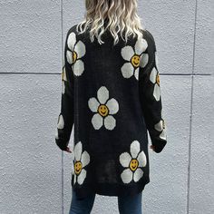 Daisy Smiley Face Button Down Longline Knit Cardigan This cozy upgraded classic cardigan is a timeless wardrobe stapleEffortless pairing with your favorite tops and jeans.Beautiful daisy flower print with a smiley face in the center.Gold color button front closure.Ribbed accent on hem and sleeve ends.Oversized longline length past the hip.Perfect lightweight sweater jacket for fall & winter shopping, at the office or out to dinner this will be your go to. Details: Color: Black, white, yellow Sle Flower Cardigan, Style Casual Chic, Longline Cardigan, Long Sleeve Knitted Cardigan, Picture Style, Button Down Cardigan, Knitted Flowers, Floral Cardigan, Cardigan Long