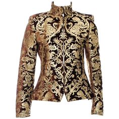 New Roberto Cavalli Brown Metallic Gold-Leafing Velvet Evening Blazer F/W 2006 Collection Designer sizes available 42 and 44 - US 6 and 8 Unique Cavalli Metallic Gold-Leafing Design over the Brown Velvet, Designed by 2 ways for Closing at Front, Hook-and-Eye Closure, Animal Print Silk Lining, Padded Shoulders, Double Vent at Back, Pockets at Front. Measurements: Size 42: Length - 24 inches, Bust - 34", Waist - 30", Sleeve - 25". Size 44: Length - 24 inches, Bust - 36", Waist - 32", Sleeve - 25". Businesses Woman, Fantasy Suit, Gold Leafing, Beaded Cardigan, Silk Cardigan, Designer Jackets, Goth Style, Fire Bird, Boucle Jacket