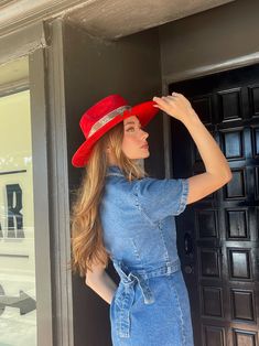 Our love of hats continues with this incredible handmade original: meet the Luxe Banded Hat in red. A hat this good needs to be worn as much as possible and with every single outfit! Hand made by artisans, incredible quality, pure suede, genuine leather trim around the crown, iconic trim, the list goes on! Will ship 12/1. The best part? It's super structured with an elastic band on the inside that will fit EVERYONE. Btw never taking this hat off. These hats are a limited edition. THE HAT:-Rancher style hat, pure suede-Stiff brim with elastic hat band on the inside-- OMG YES-Classic, standout red-Genuine leather trim and chain-- talk about luxe-Incredible quality-Holds it's shape amazingly 22.5 inches 3.5 inch brim // 4 inch crown100% suede Red Fitted Fedora For Kentucky Derby, Red Western Fedora For Kentucky Derby, Casual Red Wide Brim Felt Hat, Red Western Fedora With Short Brim, Western Style Red Fedora With Short Brim, Red Fedora With Flat Brim, Red Fedora With Curved Brim For Rodeo, Red Brimmed Hat Bands For Kentucky Derby, Red Western Hat Bands For Kentucky Derby