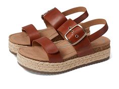 Aetrex Vania - Women's Sandals : Cognac : Aetrex arch placement may feel a bit further back, this position is proven to help relieve heel/arch pain plantar fasciitis. This arch placement is backed by research, Dr. recommended and customer approved. The Aetrex Vania Sandals bring in a fresh appeal with their braided design on the outsole. Leather upper. Ultrasky cushioning microfiber insole with arch support. Cork and jute midsole. Adjustable ankle straps with buckle closure. Microfiber fabric footbed. Round toe design. Rubber outsole. Imported. Brown Slip-on Huarache Sandals For Summer, Brown Slip-on Huarache Sandals With Woven Sole, Brown Non-slip Synthetic Sandals, Brown Woven Leather Closed-toe Sandals, Brown Leather T-strap Sandals With Woven Sole, Women's Sandals, Ankle Straps, Toe Designs, Arch Support