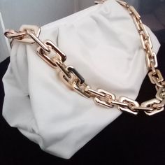 The Chain Pouch Brand New Item Gold Hardware Color: Ivory White Bags With Gold-tone Hardware As A Gift, White Bags With Gold-tone Hardware For Gifts, Trendy White Pouch Evening Bag, White Shoulder Bag With Gold-tone Hardware As Gift, Gold Shoulder Bag Clutch With Chain, Gold Shoulder Clutch With Chain, Gold Pouch Clutch With Chain Strap, White Bag With Chain Strap, Gold Chain Strap Pouch Clutch