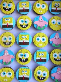 the cupcakes are decorated with cartoon characters