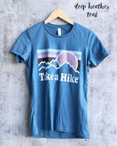 Take a hike shirt/ hiking shirt/ladies hiking shirts/womans | Etsy Cotton Crew Neck T-shirt For Outdoor Activities, Blue Short Sleeve T-shirt For Outdoor, Crew Neck T-shirt With Letter Print For Hiking, Graphic Tee With Sublimation Print In Tri-blend Fabric, Tri-blend Graphic Tee With Sublimation Print, Blue Graphic Print Top For Outdoor, Cotton Tops With Front Print For Outdoor Activities, Blue Graphic Tee For Outdoor Activities, Blue T-shirt With Letter Print For Outdoor