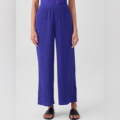 New With Tag Color: Blue Violet A Timeless Wide-Leg Pant With An Ankle-Baring Length And Long Side Slits. In Woven Pliss, A Fluid Weave With Finely Gathered Pleats. Style No. F3rbc-P4656 Slim Through The Hips, Wider Through The Leg. Fits The Body With Ease. Model Is 5'10" And Wearing A Size Small. 1-Inch Elastic Waistband, 6-Inch Side Slits. 11-Inch Rise; 27 1/2-Inch Inseam; 12-Inch Leg Opening (Size Small A Dimensional Weave With Uneven, Crinkled Texturedress It Up Or Dress It Down. With Sustai Textured Dress, Blue Violet, Eileen Fisher, Wide Leg Pants, Pant Jumpsuit, 1 Inch, Wide Leg, Color Blue, Pants For Women