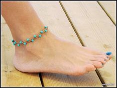 "Elevate your style with our Leather Braided Anklet with Turquoise Beads, a stunning piece that effortlessly captures the essence of natural beauty. Handcrafted with precision, this anklet showcases a vibrant turquoise color that adds a pop of color to your ensemble. The braided design exudes a bohemian charm, perfect for those seeking a free-spirited style. Made with genuine leather, this anklet ensures durability and comfort. Whether you're strolling on the beach or attending a summer festival Turquoise Strand Anklets For Festival, Turquoise Beaded Anklets For Festival, Turquoise Beaded Anklets For Beach Season, Turquoise Anklets With Tiny Beads For Festival, Adjustable Turquoise Strand Anklets, Bohemian Strand Anklets With Tiny Beads, Beach Season Ankle Wrap Jewelry, Turquoise Round Beads Anklets For Beach, Turquoise Beaded Anklets For Beach