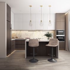 two bar stools sit in front of a kitchen island