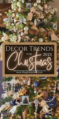 a christmas tree decorated with ornaments and lights in blue, white and gold colors is featured for the decor trend for christmas