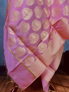 Baby Pink Color Dupatta with Gold Zari Weaved Big diya Buttas with nice borders. Gold Zari Weave. The tassels are beige in Color matching the gold Zari. Item: DupattaBase color : Baby PinkFabric : Soft Silk (Not Pure Silk)Work : Zari Weaved with tasselsLength of the Dupatta : 92 inches approx.Width of the dupatta : 35 inches (Approx.)Store Policies- No return or exchange will be accepted for color variations.- No return or exchange will be accepted if the color does not match your other clothing Benarasi Dupatta, Designer Dupatta, Baby Pink Color, Baby Pink Colour, Designer Outfits, Readymade Blouse, Indian Designer Outfits, Indian Designer, Pink Fabric