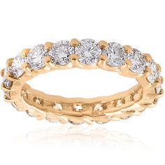 Womens ring features round cut diamonds.  All diamonds are prong set in solid 14k yellow gold high polished prong setting. Three Stone Diamond Ring, First Blood, Diamond Eternity Ring, Womens Ring, Three Stone Diamond, Wedding Anniversary Rings, Eternity Ring Diamond, Womens Wedding Bands, Pompeii