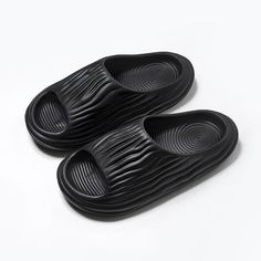 Step into comfort and style with our Summer Platform Sandals for Women. Designed for those who value both aesthetics and practicality, these sandals feature a chic, minimalist design perfect for various occasions—from a day at the beach to casual outings. Key Features These versatile slides are crafted from high-quality EVA material, ensuring durability and comfort. The non-slip sole provides stability on wet or dry surfaces, making them ideal for indoor or outdoor wear. With a heel height of ju Summer Leisure Slippers, Black Casual Platform Slippers For Summer, Solid Color Platform Slippers For Beach And Summer, Trendy Flat Sandals For Leisure, Modern Summer Platform Slippers With Open Toe, Trendy Solid Color Slip-on Sandals, Trendy Lightweight Slides, Comfortable Solid Color Platform Slippers For Summer, Black Open Toe Sandals For Leisure