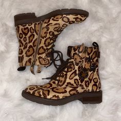 Nwot! These Boots Have Never Been Worn And It Shows! No Sole Wear, No Wear Inside The Shoe, No Flaws At All! These Are Absolutely Gorgeous And Perfect For The Fall! Luxe Hair On Genuine Leather, Two Zippers On Either Size And A Beautiful Tiger And Two Stars Appliqus On The Outside Of These. These Boots Are Comfortable And Stylish! You'll Love Having These In Your Collection! Leather Leopard Print Winter Boots, Leopard Print Round Toe Boots For Spring, Spring Leopard Print Round Toe Boots, Leopard Print Leather Ankle Boots, Leopard Print Leather Boots For Spring, Spring Leopard Print Leather Boots, Trendy Leopard Print Leather Boots, Moto Boots, Combat Boots