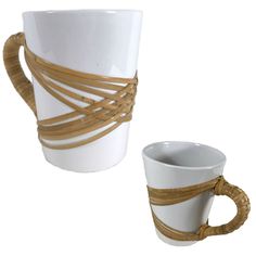 two white cups with rope wrapped around the bottom and sides, one has a coffee cup in it