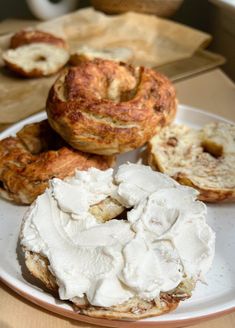 a plate with several pastries on it