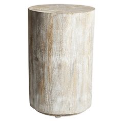 a white wooden stool sitting on top of a table