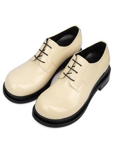 Editor's NotesSO.U:LESURES’s derby shoes give casual and minimal look with round toe style and bold outsole.- Lace-up design- Round toe style- Bold outsole- Logo lettering print in insole and under outsole- Minimal designMeasurements(in.)- Size: KR220mm(US4) - KR300mm(US12)- Heel Height: 2.4in.- Fits true to the sizeComposition & Care- 100% Leather- Please check the care labelDesigner- by SO.U:LESURES Modern Oxfords With Lug Sole, Modern Low-top Oxfords With Lug Sole, Modern Lace-up Oxfords With Lug Sole, Modern Lace-up Shoes With Lug Sole For Work, Modern Workwear Lace-up Shoes With Lug Sole, Modern Lace-up Shoes With Lug Sole And Plain Toe, Modern Patent Leather Lace-up Shoes For Derby, Derby Lace-up Shoes With Round Toe And Lug Sole, Modern Oxfords With Rubber Sole And Flat Heel