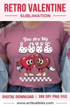 a woman wearing a pink shirt with two hearts on it and the words you are my love