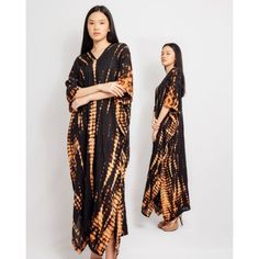 Beautiful tie dye kaftan in black and white colour, cool rayon fabric, great for summer. Batwing loose style to fit S to XL or UK 10 to 16. Legnt from top shoulder to hem 135 cm Armpit to armpit 95 cm suitable for women 5'5" and under Casual Black Kaftan For Festival, Black Maxi Dress With Batik Print, Black Bohemian Batik Print Dress, Black Bohemian Dress With Batik Print, Black Long Beachwear Kaftan, Oversized Black Kaftan For Beach Cover-up, Black Beach Maxi Dress With Kimono Sleeves, Casual Black Tunic Kaftan, Black Flowy Maxi Dress With Kimono Sleeves