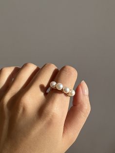 Adjustable White 14k Gold Jewelry, White Dainty Tarnish Resistant Ring, White Dainty Tarnish-resistant Ring, Dainty White Tarnish Resistant Ring, Elegant Hypoallergenic Ring Jewelry, Pearl White Round Jewelry For Everyday, Minimalist Stackable Adjustable Pearl Ring, Elegant Hypoallergenic Open Ring Jewelry, Adjustable Stackable Minimalist Pearl Ring