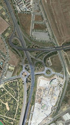 an aerial view of a highway intersection in the desert