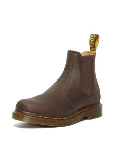 PRICES MAY VARY. Crazy Horse is heavyweight leather with a tough, worn-in appearance. Chelsea boot style Made with all the classic Docs DNA, including grooved sides, heel-loop and yellow welt stitching Built on the iconic Dr. Martens air-cushioned sole, which is oil and fat resistant, with good abrasion and slip resistance Elastic gussets Brown Dr Martens, 2976 Chelsea Boots, Chelsea Brown, Chelsea Boots Style, Brown Chelsea Boots, Dr Martens Boots, Leather Chelsea Boots, Winter Boots Women, Crazy Horse